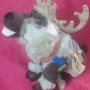 The Disney Frozen Sven Plush Stuffed Animal is a 15-inch collectible toy inspire